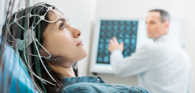 Woman undergoing an EEG. | Newsreel