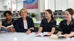 Mary MacKillop College Nundah principal Erin Wedge and students.