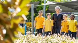 St Paul's School Woodridge Helen Boyes with students. | Newsreel