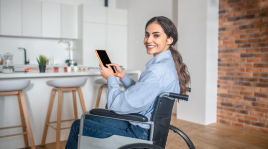 Disabled woman with home automation system. | Newsreel