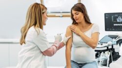 Pregnant woman getting an injection. | Newsreel