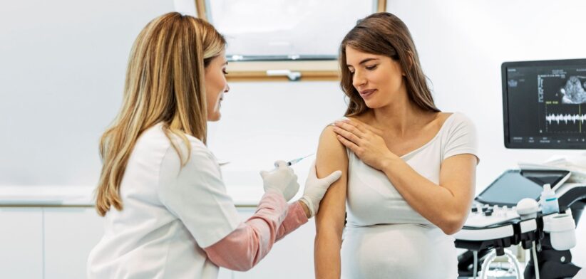 Pregnant woman getting an injection. | Newsreel