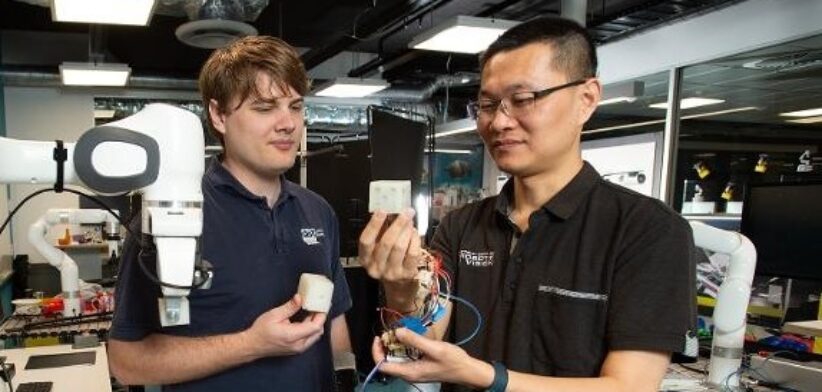 Dr Fangyi Zang, right, and research assistant Maceon Knopke from QUT . | Newsreel