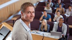 Lecturer in classroom. | Newsreel |