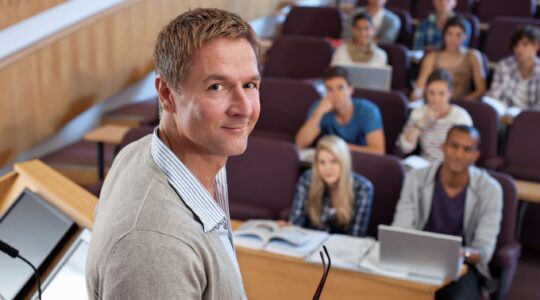 Lecturer in classroom. | Newsreel |