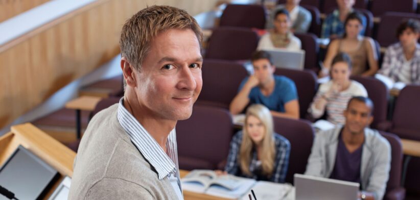 Lecturer in classroom. | Newsreel |