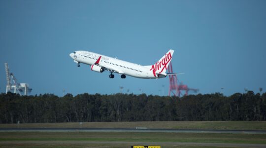 Virgin plane takes of from Brisbane Airport . | Newsreel