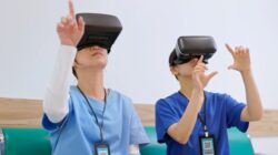 Health care workers using virtual reality goggles. | Newsreel