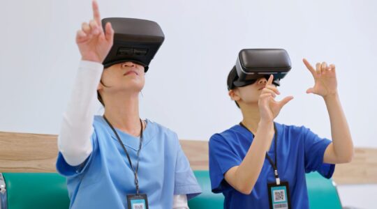 Health care workers using virtual reality goggles. | Newsreel