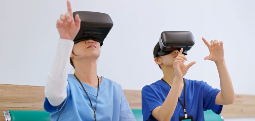 Health care workers using virtual reality goggles. | Newsreel