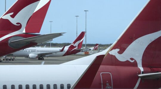 Qantas planes at Brisbane terminal. | Newsreel