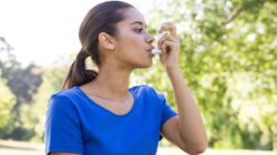 Woman using asthma inhaler. | Newsreel