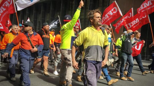 Striking workers marching. | Newsreel