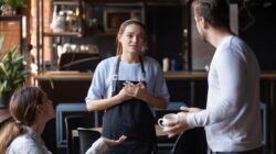 Worker being confronted by angry customers