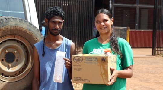 Denis Coolwel and Rosie Wooley wit groceries and receipt in Tiwi Islands. | Newsreel