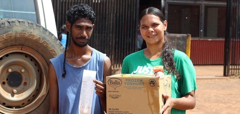 Denis Coolwel and Rosie Wooley wit groceries and receipt in Tiwi Islands. | Newsreel