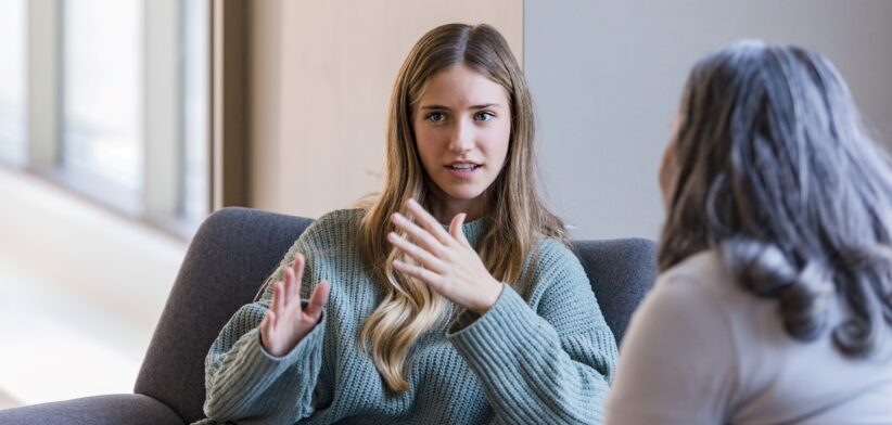 Young woman in counselling session. | Newsreel