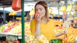 Woman smelling fresh food. | Newsreel