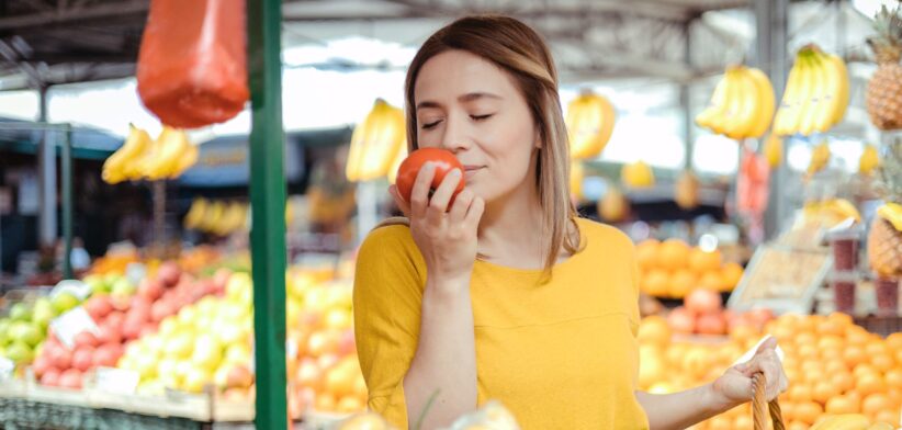 Woman smelling fresh food. | Newsreel