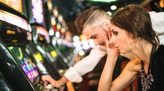 Sad couple gambling. | Newsreel