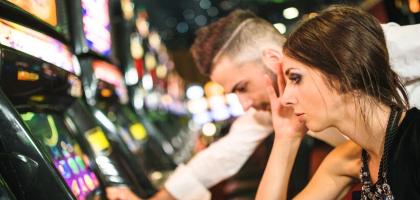 Sad couple gambling. | Newsreel