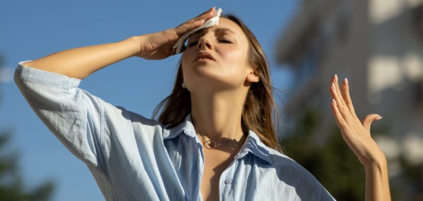 Woman suffering heat stress. | Newsreel