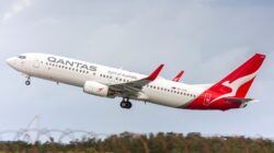 Qantas plane taking off from Brisbane airport. | Newsreel