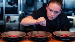 Chef working on restaurant dishes. | Newsreel