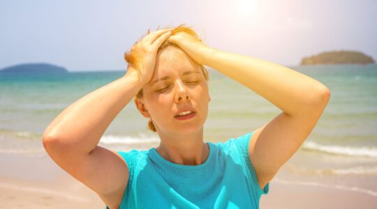 Woman with heat stress. | Newsreel