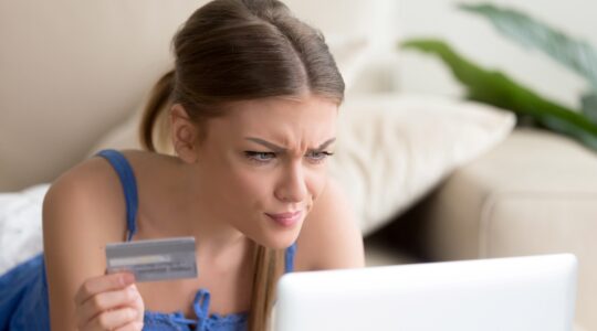 Woman frustrated with online purchase. | Newsreel