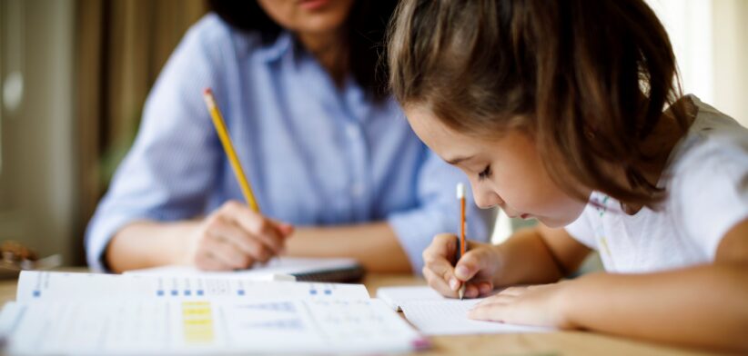 Child with a tutor. | Newsreel