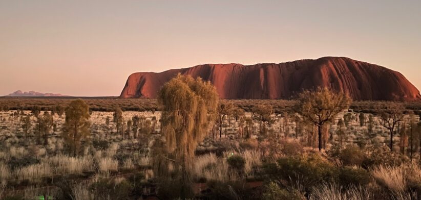 Uluru with Kata Tjuṯa in the background. | Newsreel