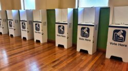 Voting booths. | Newsreel