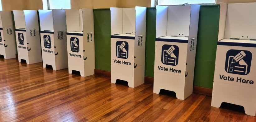 Voting booths. | Newsreel