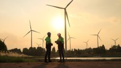 Workers on a wind farm. | Newsreel