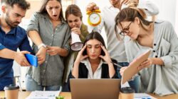 Woman stressed at work. | Newsreel