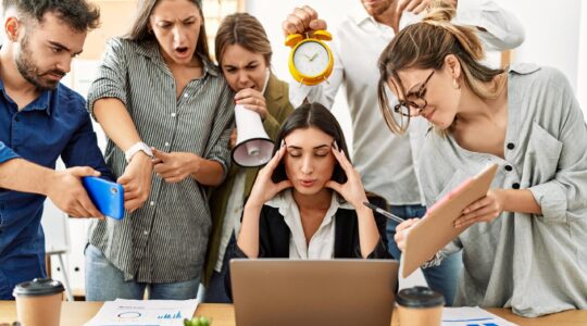 Woman stressed at work. | Newsreel