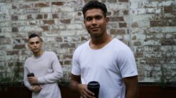 Aboriginal man drinking coffee. | Newsreel