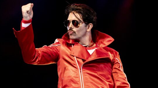 Freddie Mercury tribute performer. | Newsreel