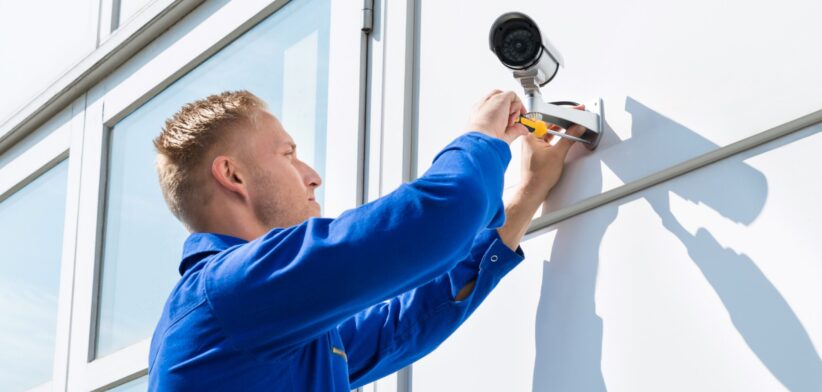 Security camera being installed. | Newsreel