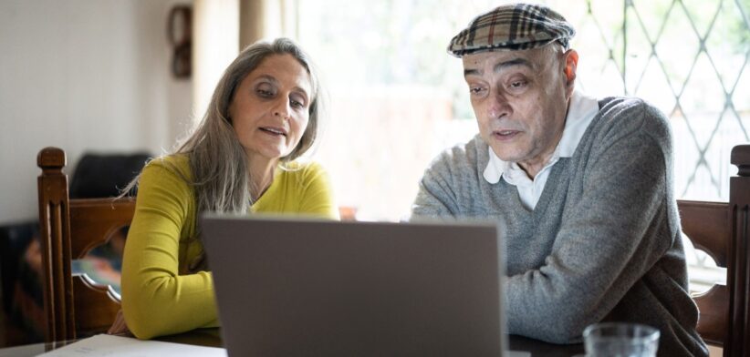 Elderly couple on computer. | Newsreel