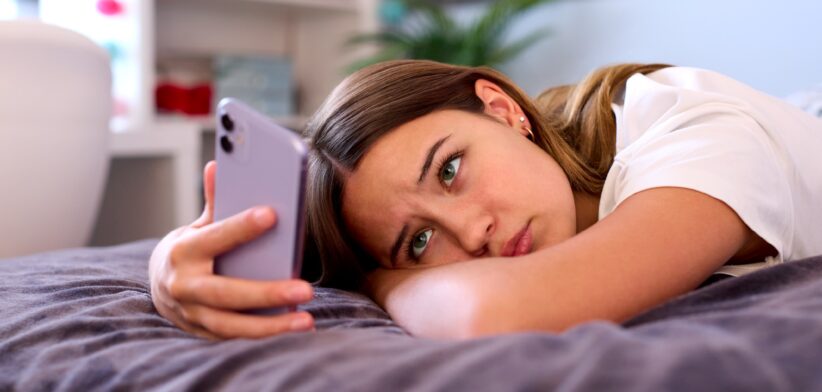 Teenager on mobile phone. | Newsreel