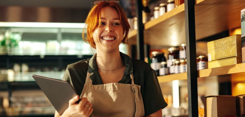 Female business owner in a store. | Newsreel