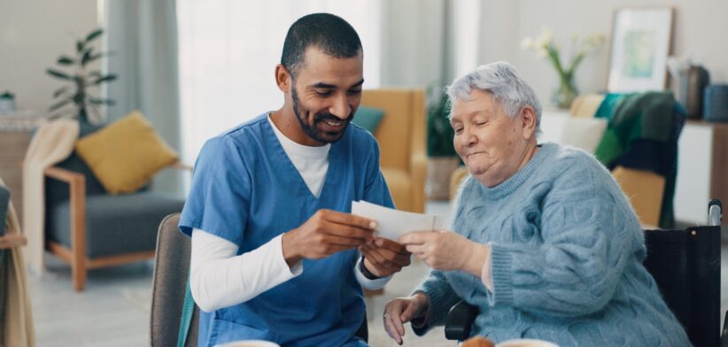 Aged care worker and elderly woman. | Newsreel