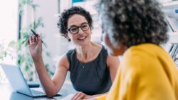 Woman providing advice to another woman.