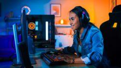 Young girl playing video game. | Newsreel