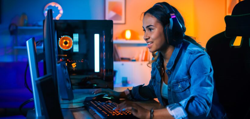 Young girl playing video game. | Newsreel