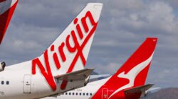 Virgin and Qantas plane tails. | Newsreel