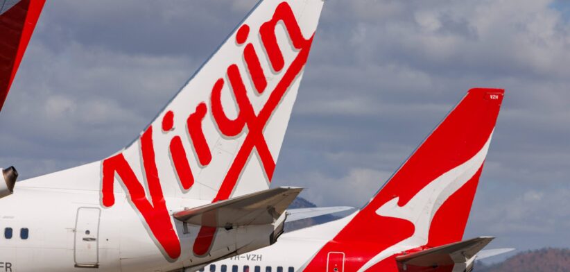 Virgin and Qantas plane tails. | Newsreel