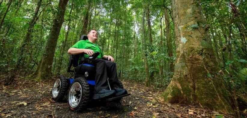 4WD wheelchair in rainforest. | Newsreel